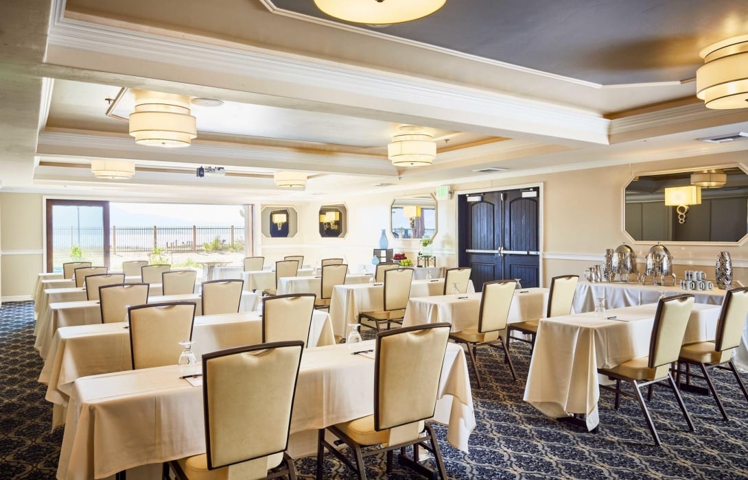 Lakeside ballroom with dining table setup