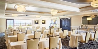 Lakeside ballroom with dining table setup