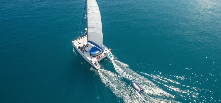 Aerial view of a paddle wheel cruise in the blue waters