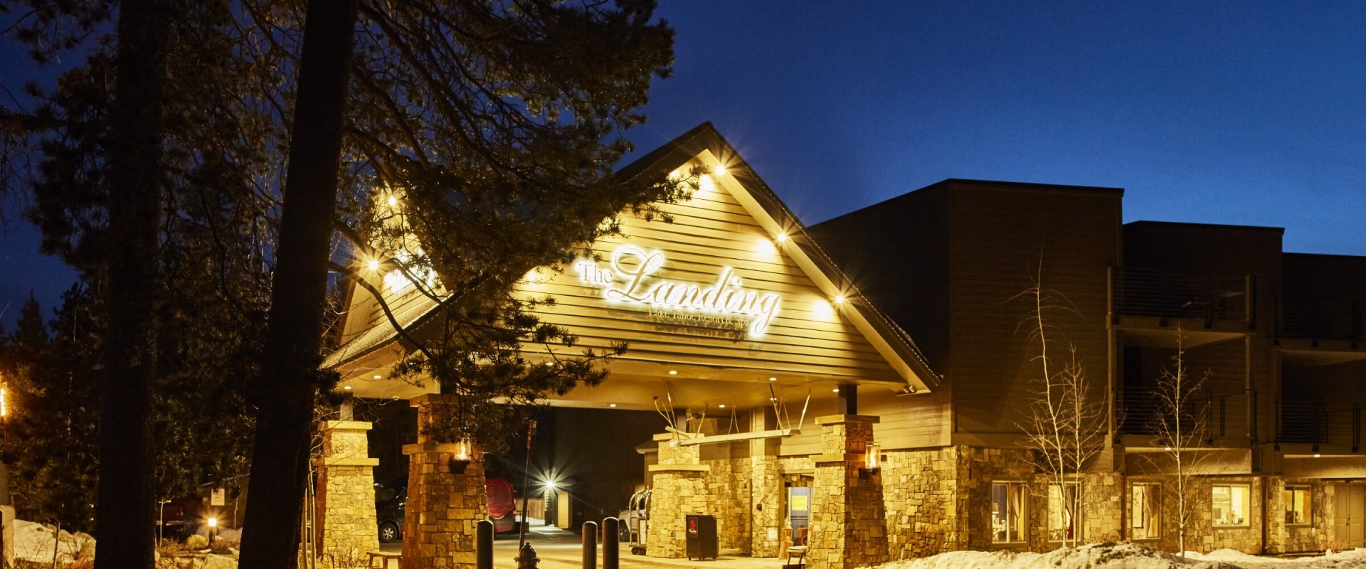 The Landing Resort and Spa building front lit up at night