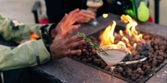 The Landing Tahoe Fire pit with a martini