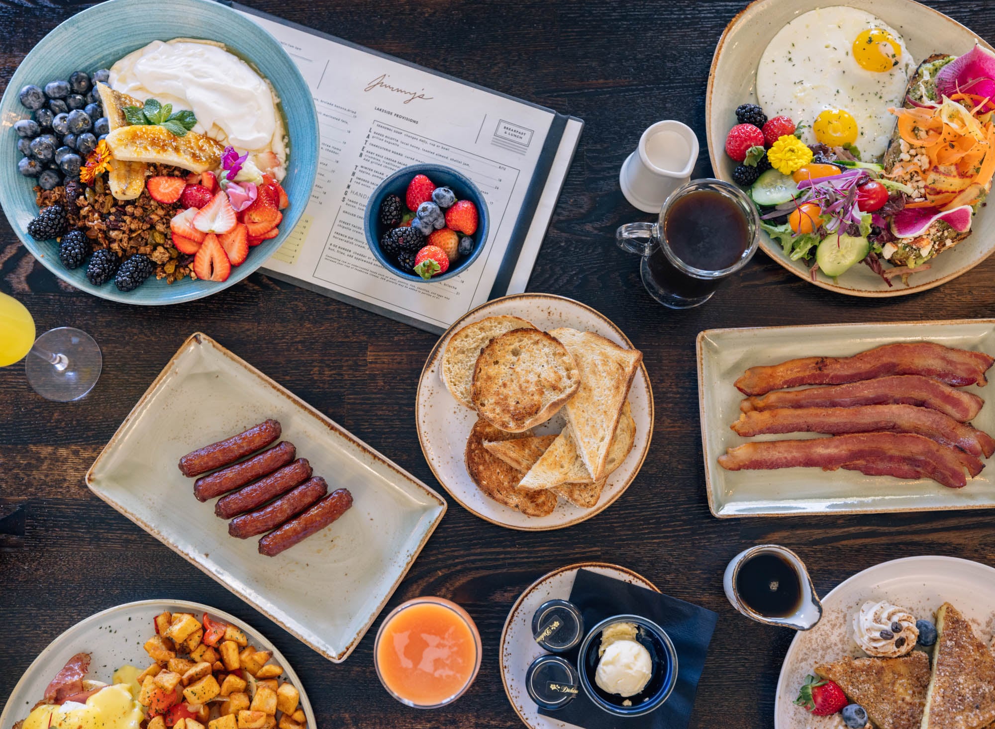 A table set with various breakfast foods