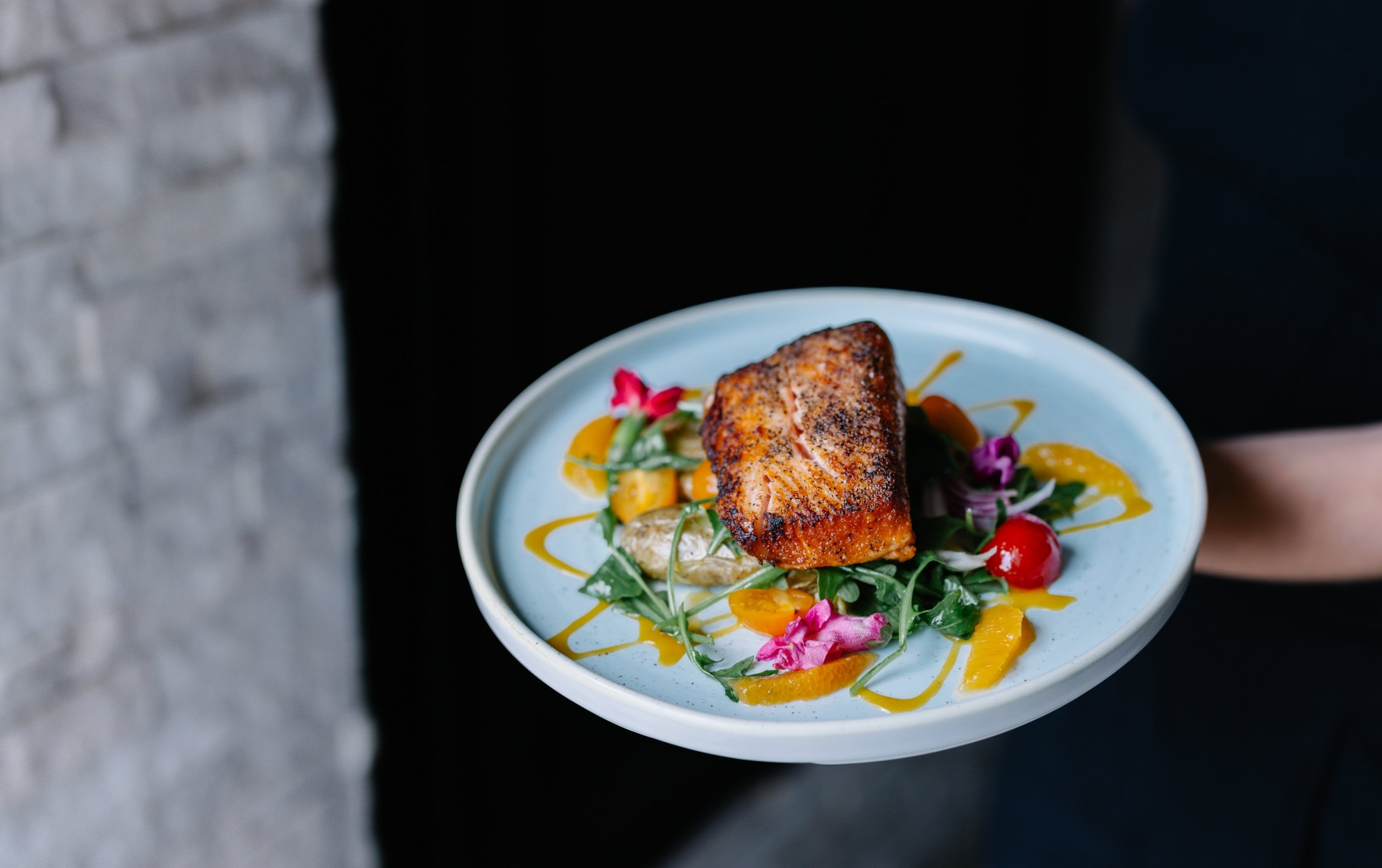 A blue plate with food