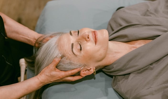 Woman receiving Craniosacral massage