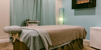Massage bed set up in room