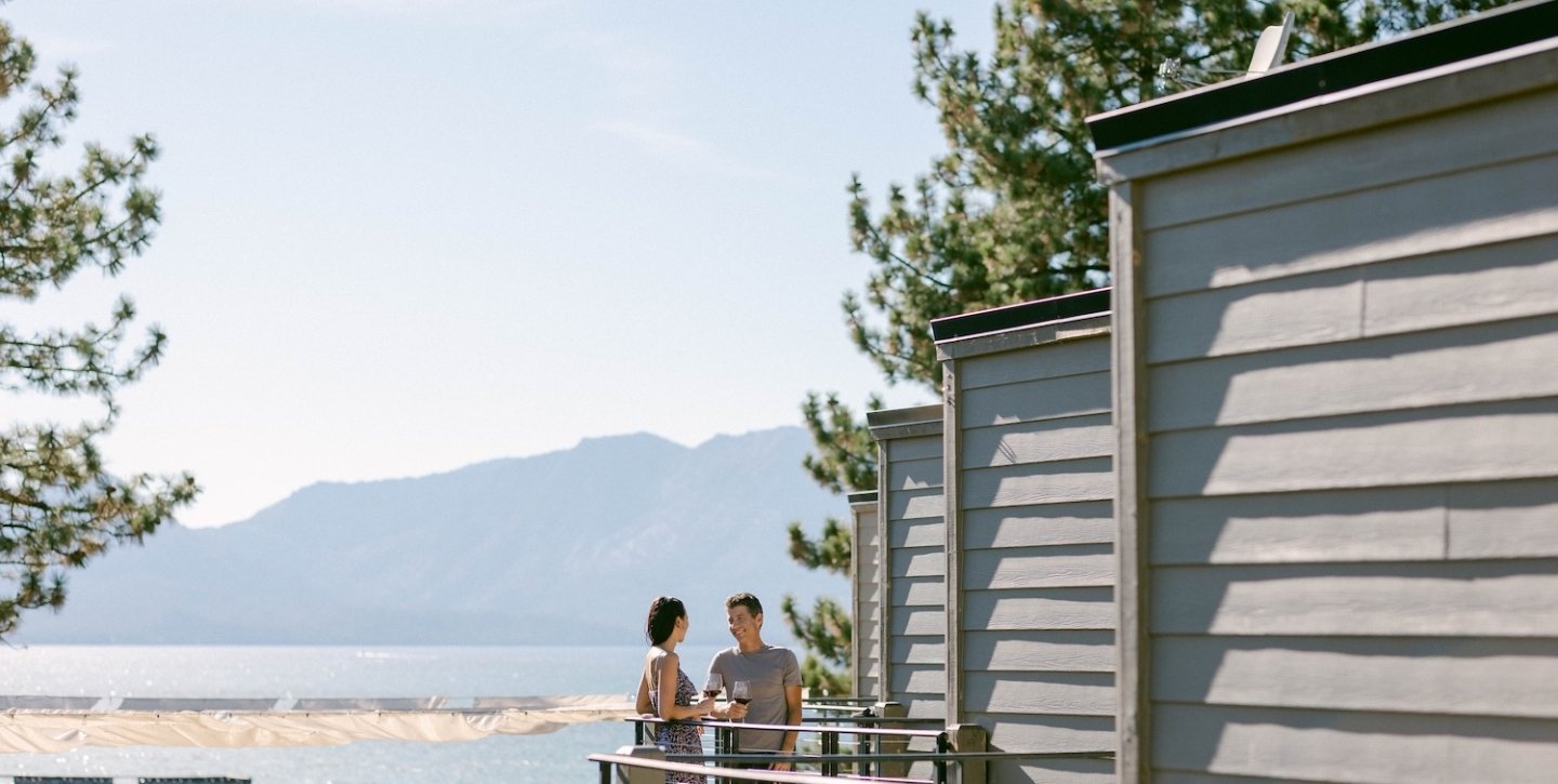 Couple drinking wine on the balcony