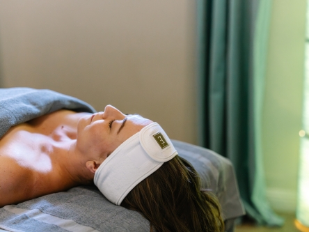 Woman receiving Spa Maternity Massage in headband