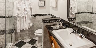 King size bathroom with vanity and shower